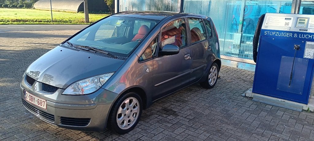 Mitsubishi colt 1.5 benzine bj2006, Auto's, Voorwielaandrijving, Stof, Colt, Overige kleuren