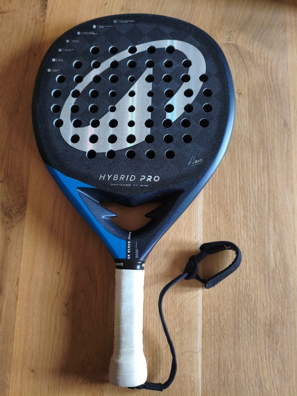 Kuikma Hybrid Pro padel racket, Ophalen