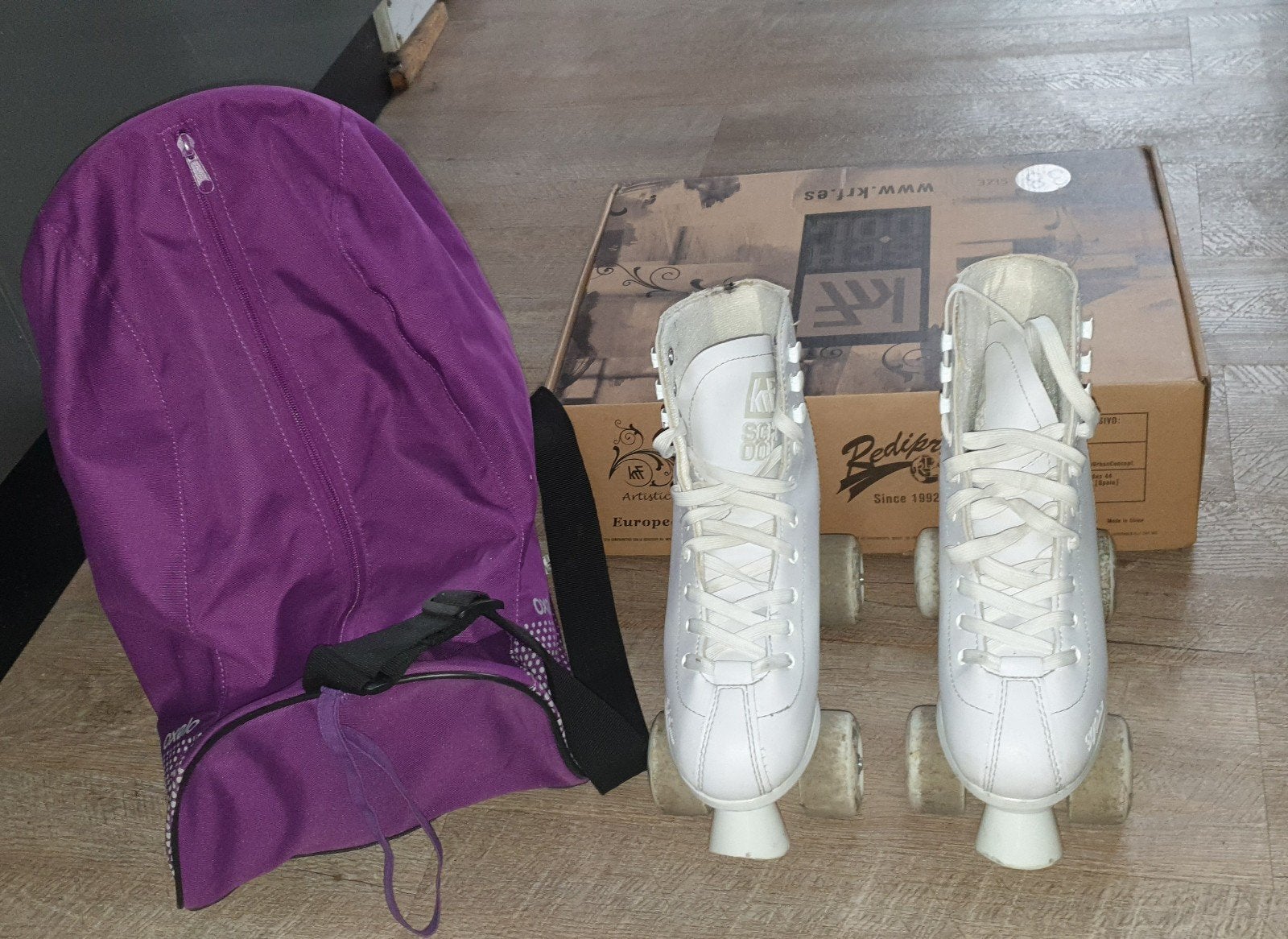 Patins à roulettes en cuir KRF pointure 38 + sac + protectio