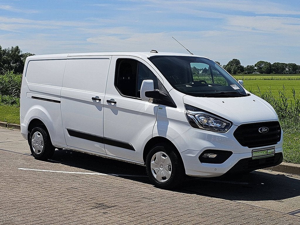 Ford Transit Custom 300 2.0 TDCI L1H2 Trend WF0YXXTTGYPS1370, Auto's, Voorwielaandrijving, Stof, 4 cilinders, Wit