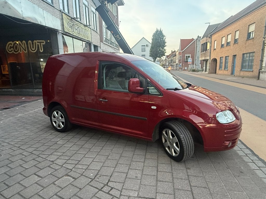 Volkswagen Caddy 2.0SDi 69ch — 2ème main service récent Clim, 4 deurs, Zwart, Bedrijf, https://public.car-pass.be/vhr/2ccb0d04-3fcf-4838-bd75-b4968b2711bb?lang=fr