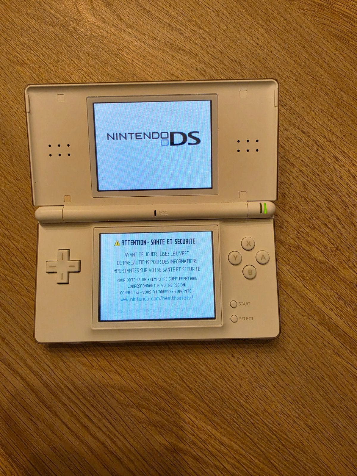 Console nintendo Ds Lite Blanche avec chargeur., Ophalen of Verzenden, Gebruikt, Wit, DS Lite