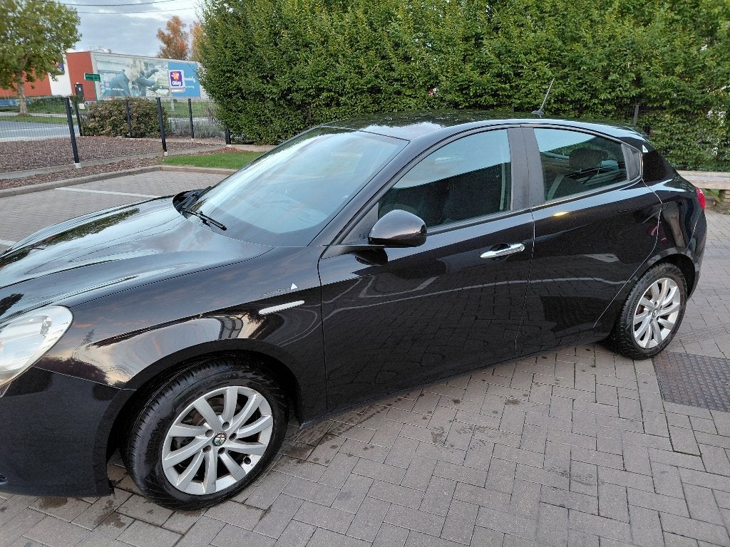 Alfa Romeo Giulietta 1.6 JTDm Distinctive 2015, Auto's, Alfa Romeo, Voorwielaandrijving, Stof, 750 kg, 4 cilinders