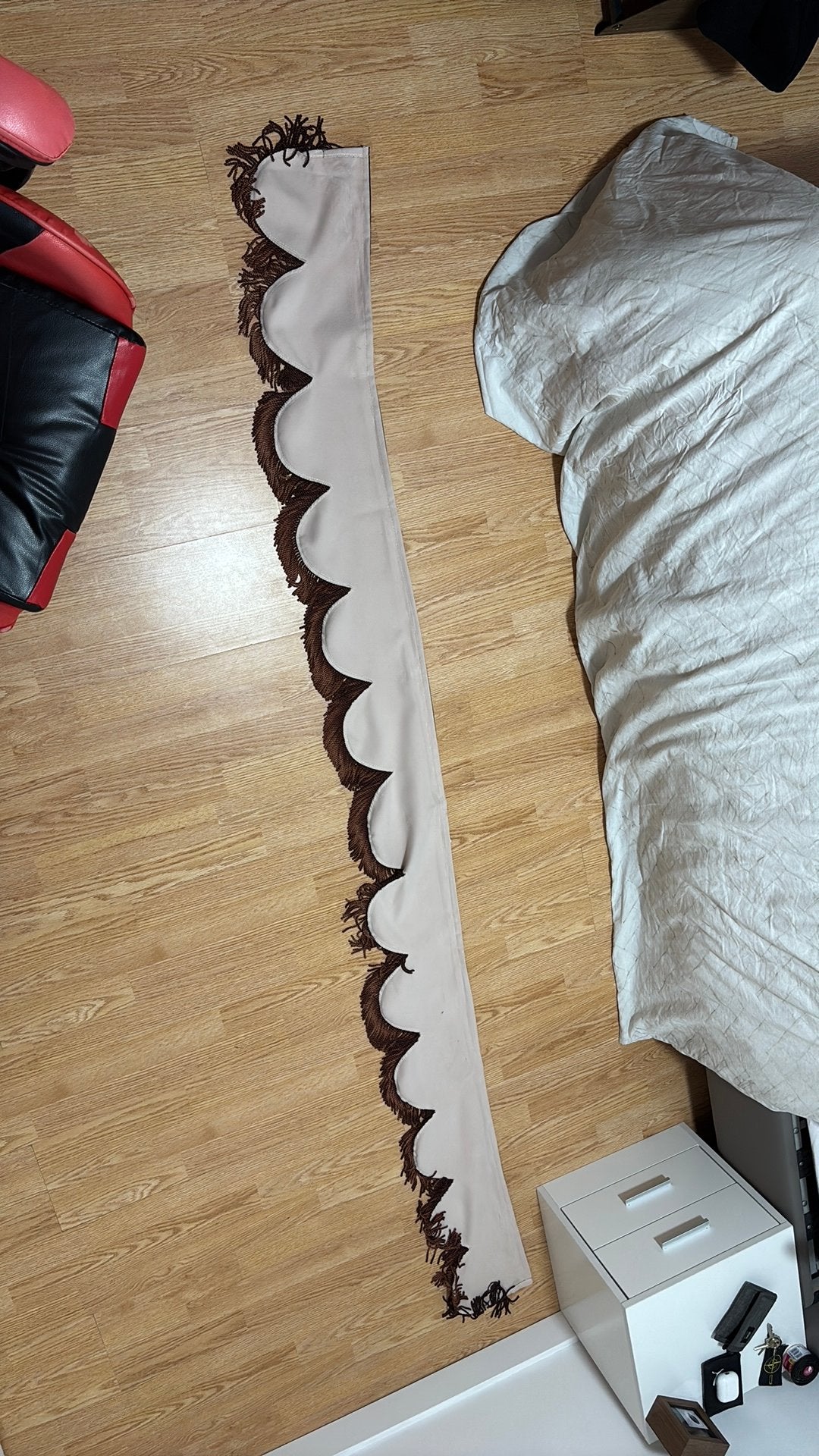 Raamband te koop in het beige met bruine franjes, Enlèvement