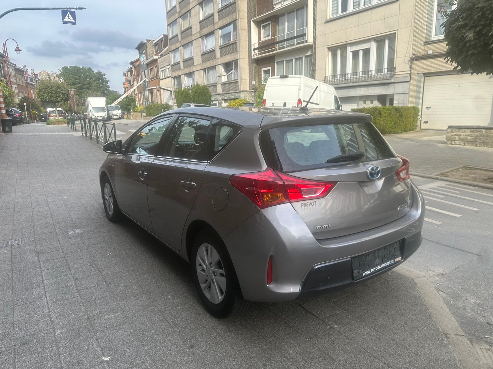 Toyota Auris hybride 161dkm 0485905657, Auto's, Euro 5, Stof, 4 cilinders, Beige