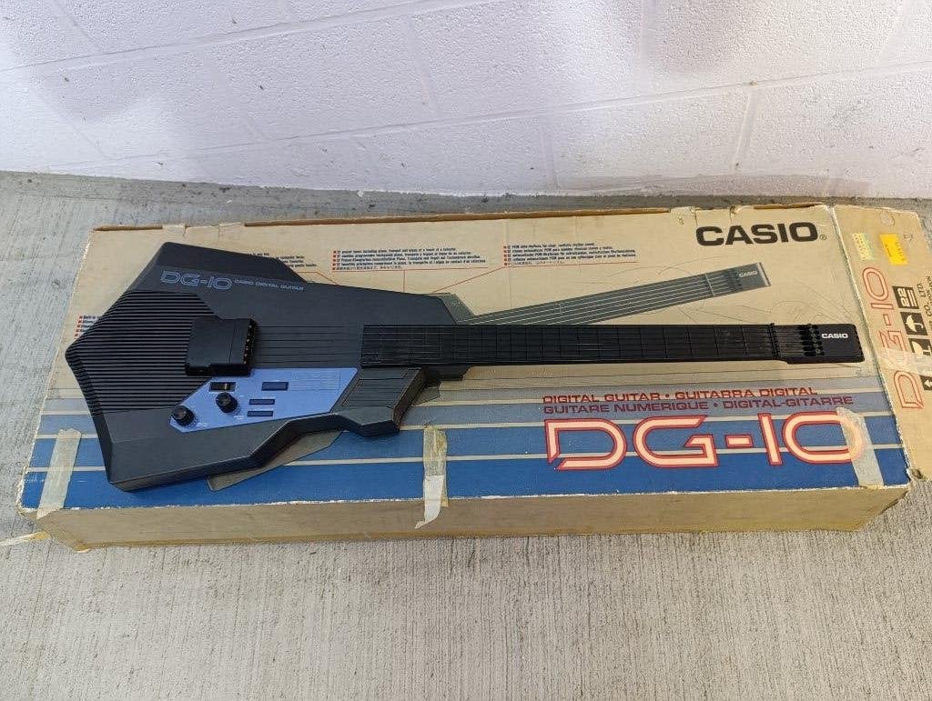 Casio DG10 digitale gitaar in originele doos, Ophalen, Gebruikt, Overige merken