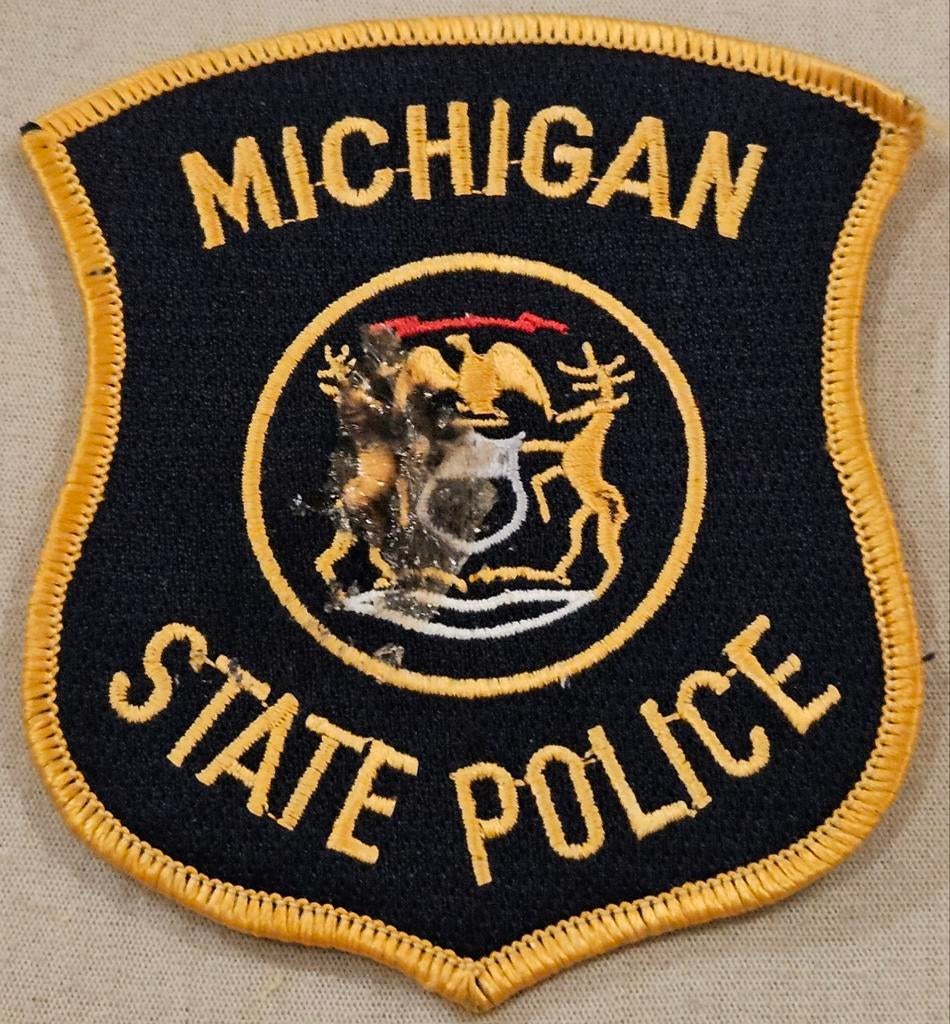 Patch de la police de l'État du Michigan (MSP)
C'est une uni, Enlèvement ou Envoi