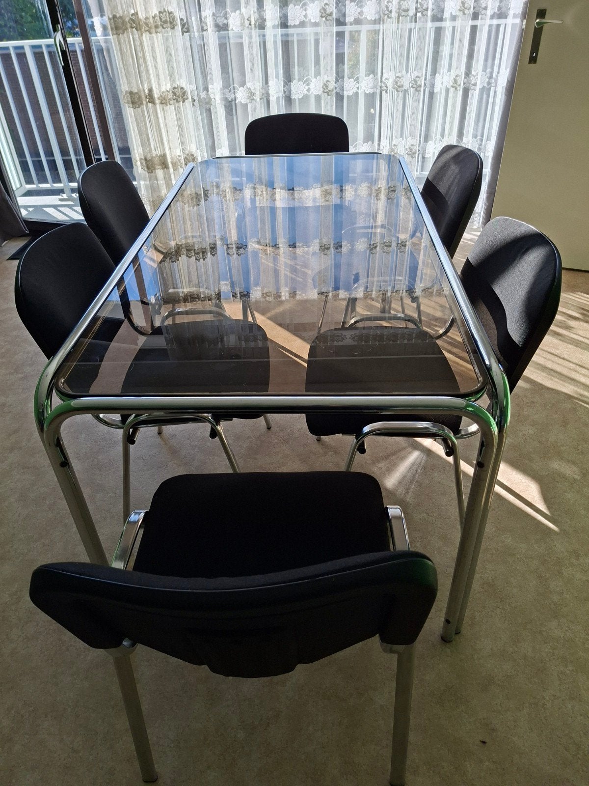 glazen tafel met 8 stoelen., Huis en Inrichting, Ophalen, Gebruikt