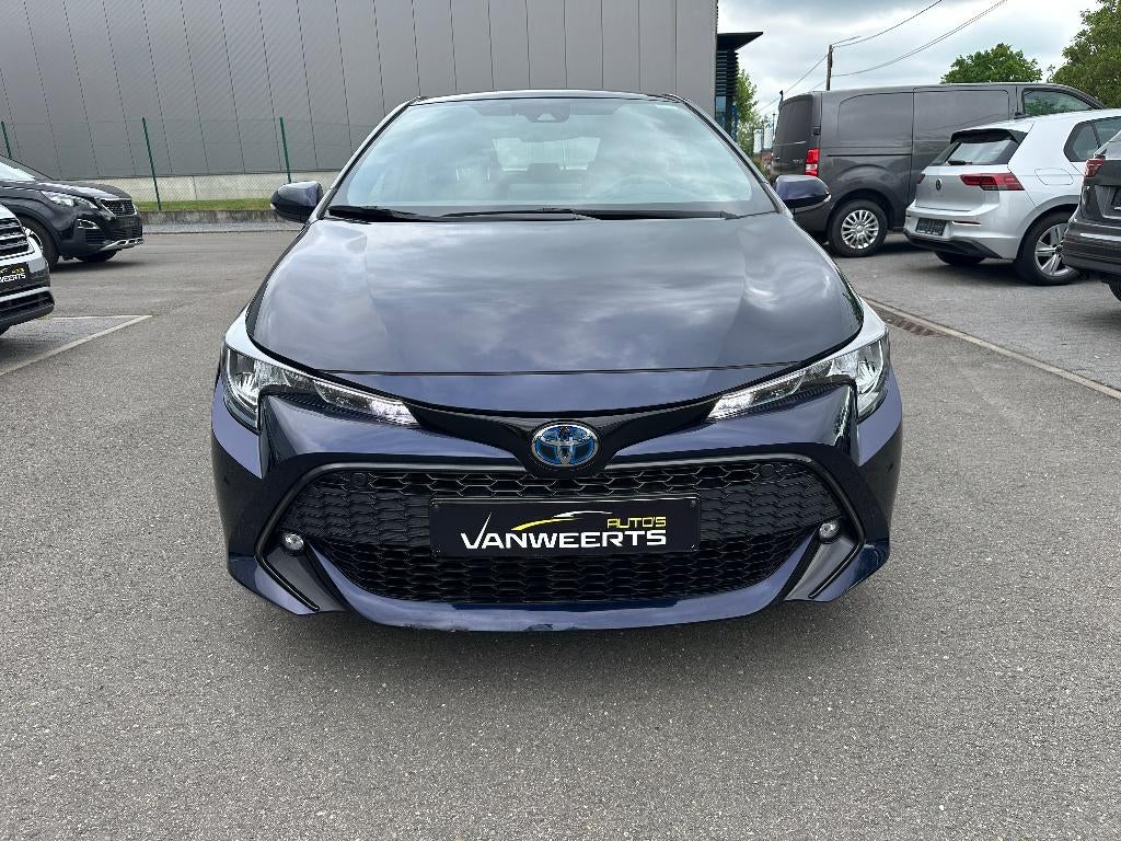 Toyota Corolla, 1.8 benzine + elektr, hybride CARPLAY/CAMERA, Auto's, Toyota, Stof, Euro 6, Blauw, Corolla