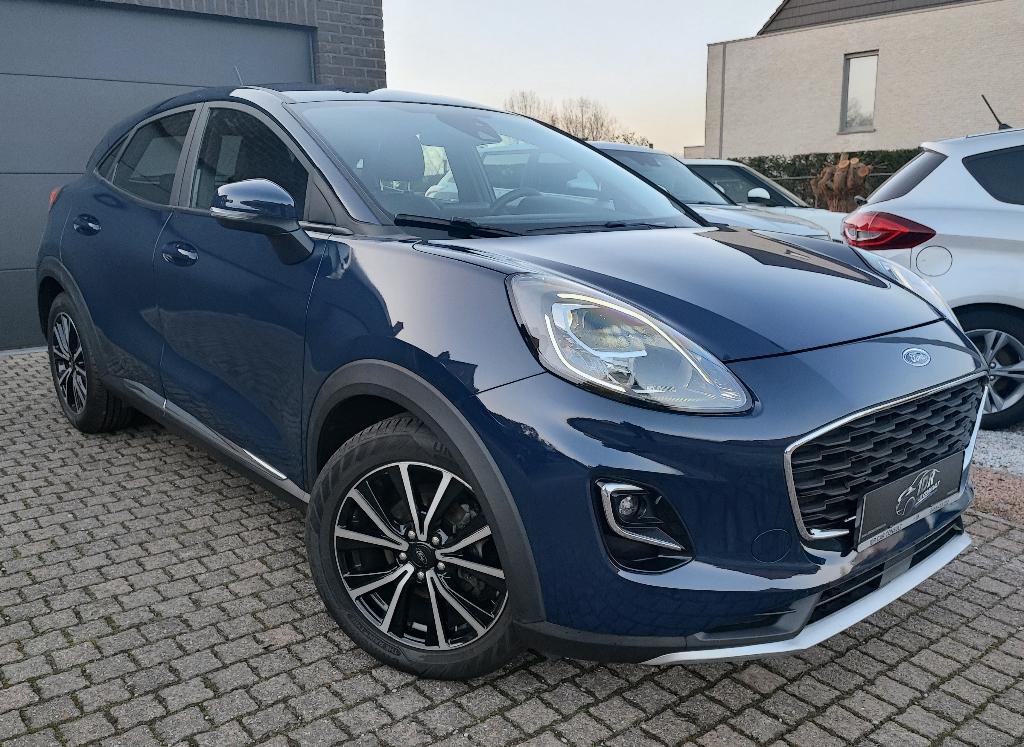 FORD Puma 1.0Hybrid Titanium +2JR GARANTIE*VEEL OPTIES!, Voorwielaandrijving, Blauw, Leder en Stof, 5 deurs