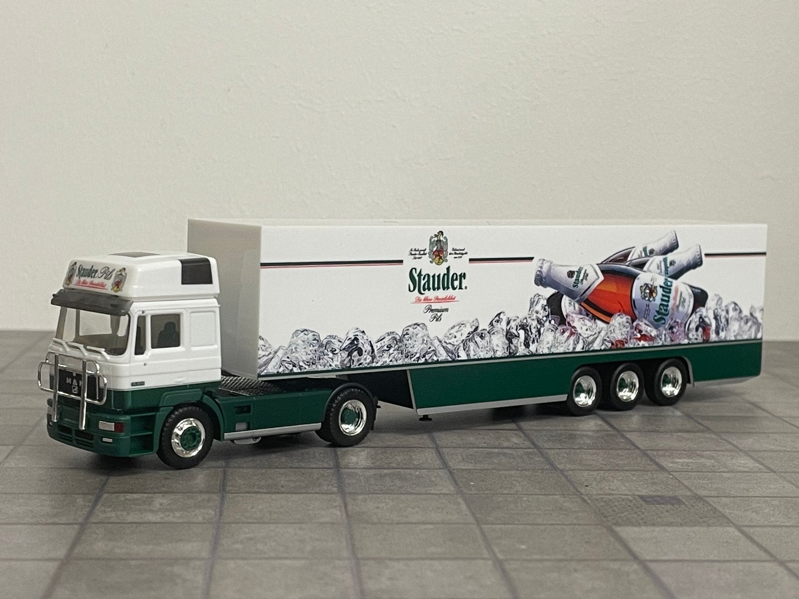 Herpa MAN F2000 HD STAUDER 1:87, Enlèvement ou Envoi, Comme neuf, Bus ou Camion, Herpa