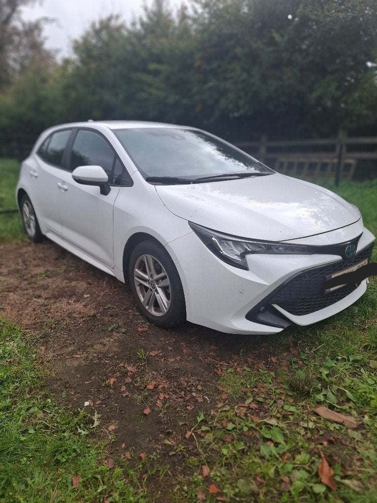 Toyota corolla 1.8l hybrid E-CVT, Auto's, Stof, Euro 6, Corolla, Wit
