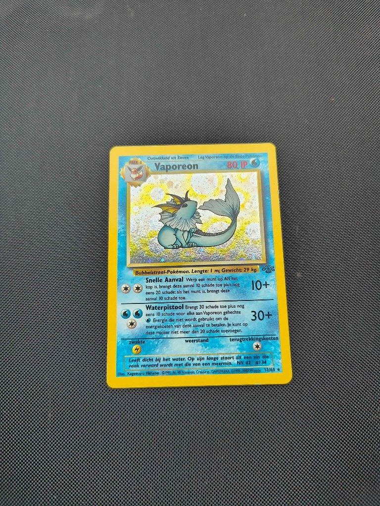 Pokemon Vaporeon jungle Nederlands, Ophalen of Verzenden, Zo goed als nieuw, Losse kaart, Foil