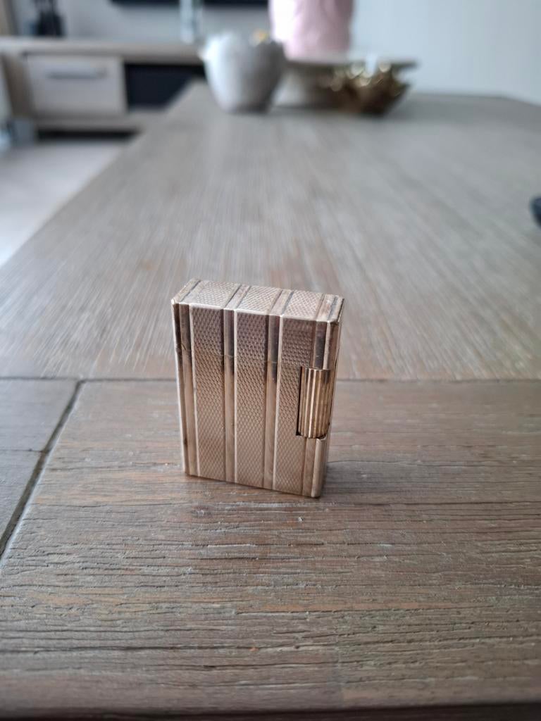 Aansteker dupont ligne 1, Ophalen