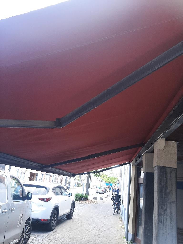 Elektrische zonneluifel ca. 7 a 8m., Ophalen