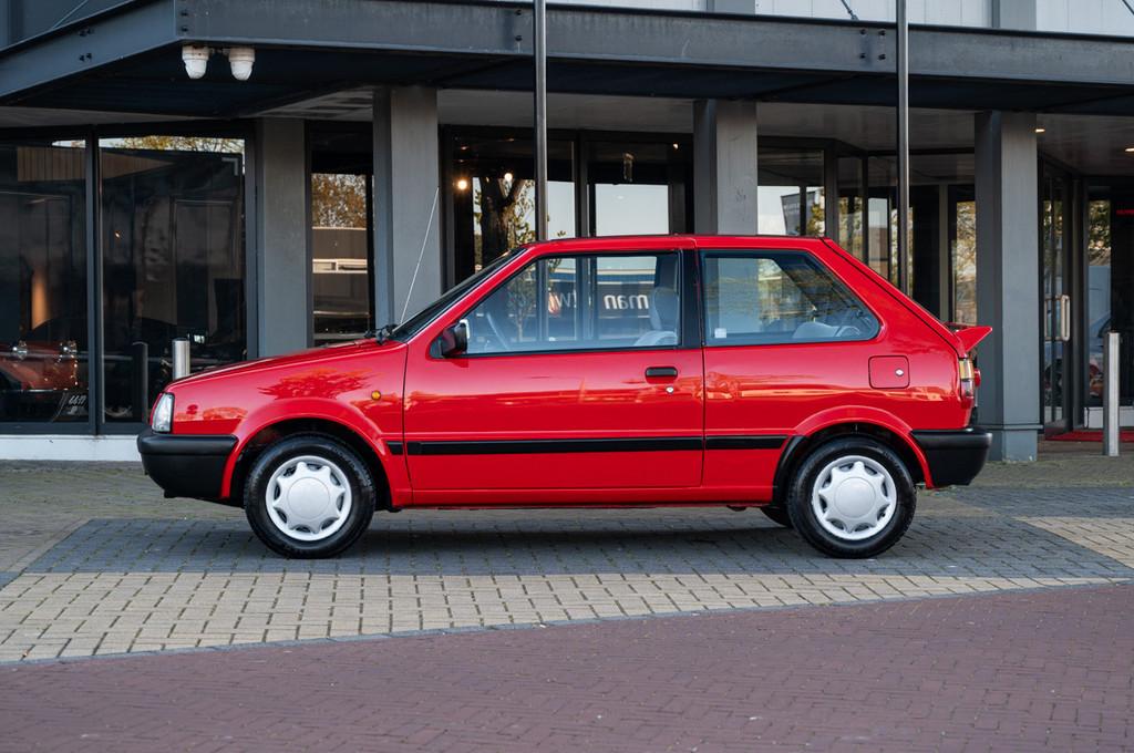 Nissan Micra 1.2 LX, Autos, Rouge, Achat, 54 ch, Entreprise