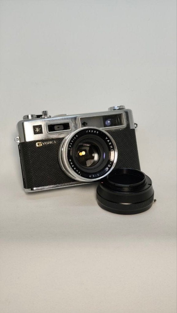 Yashica Electro 35 — Excellent état + sac d'origine, Enlèvement ou Envoi, Comme neuf, Compact, Autres Marques