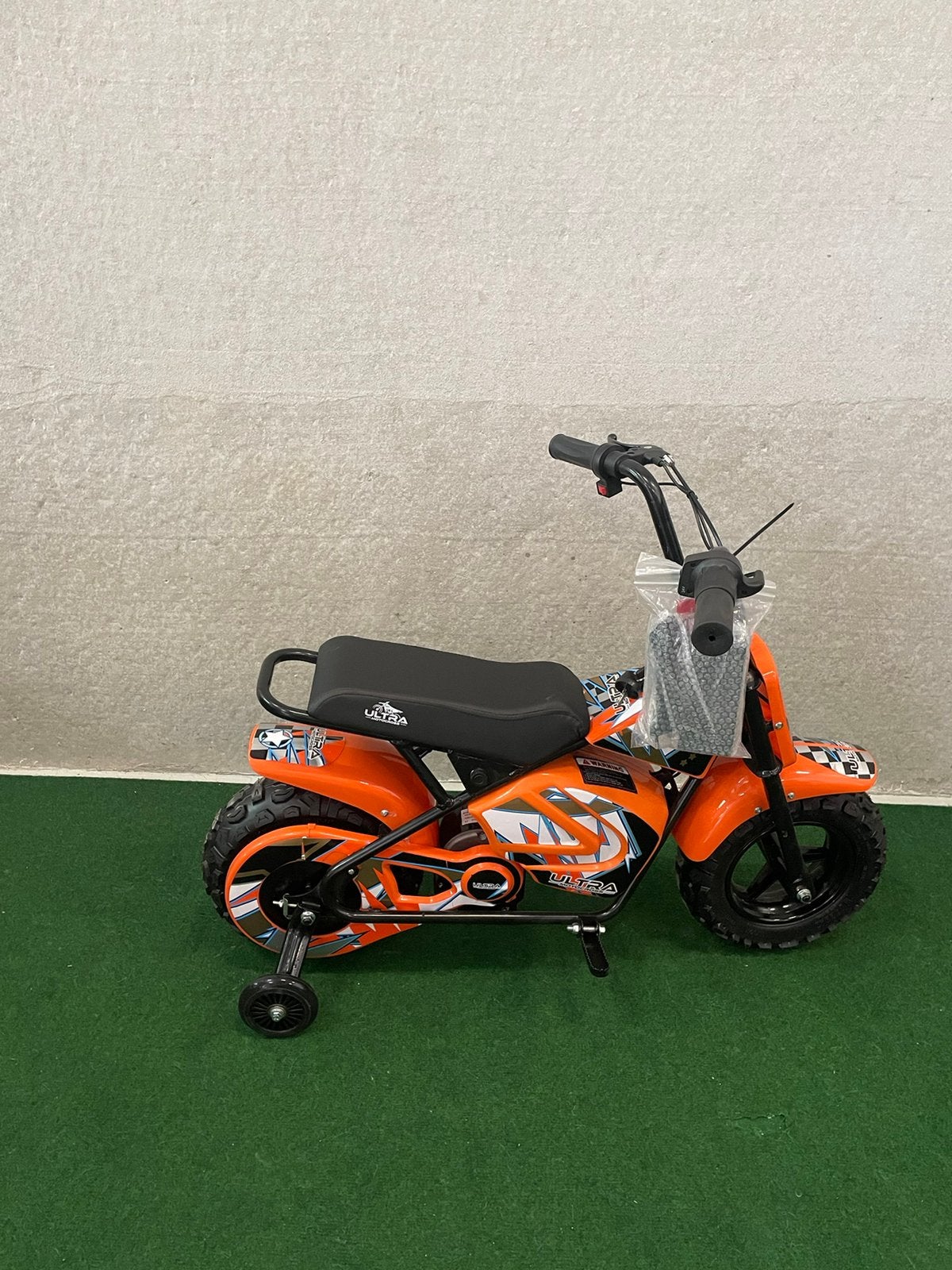 Nieuwe elektrische oranje met monkeybike met zijwieltjes, Kinderen en Baby's, Ophalen, Nieuw