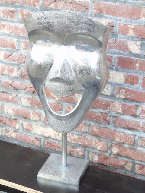 Beeld een masker op een basis van gegoten aluminium., Huis en Inrichting, Woonaccessoires | Overige, Nieuw, Ophalen of Verzenden