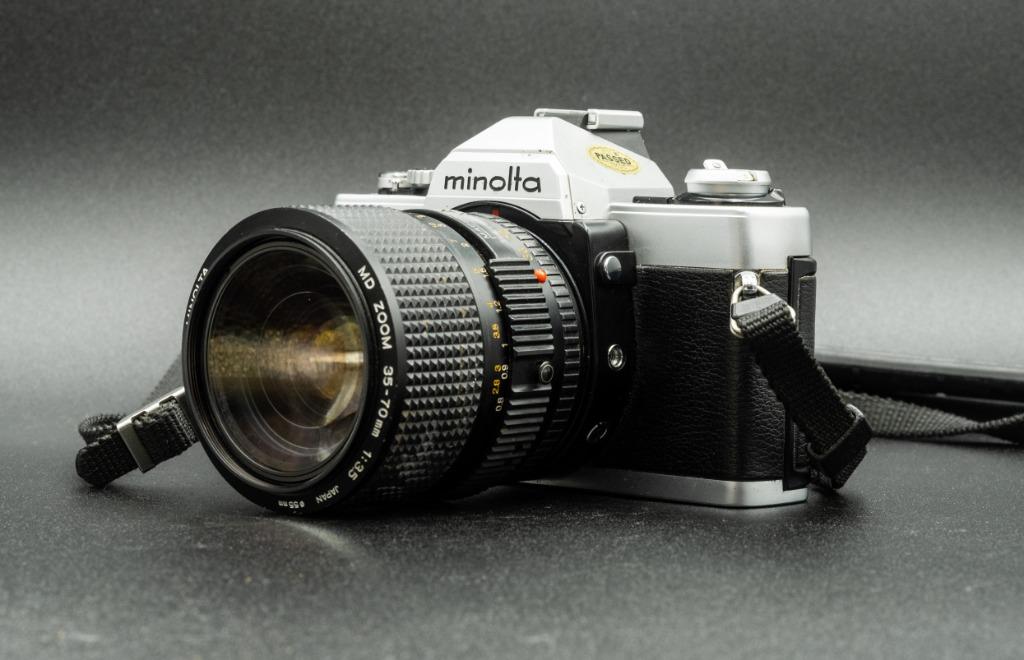 Minolta XG1 + Minolta MD Zoom 35-70 mm F3.5 + riem, Audio, Tv en Foto, Fotocamera's Analoog, Ophalen of Verzenden, Gebruikt, Minolta