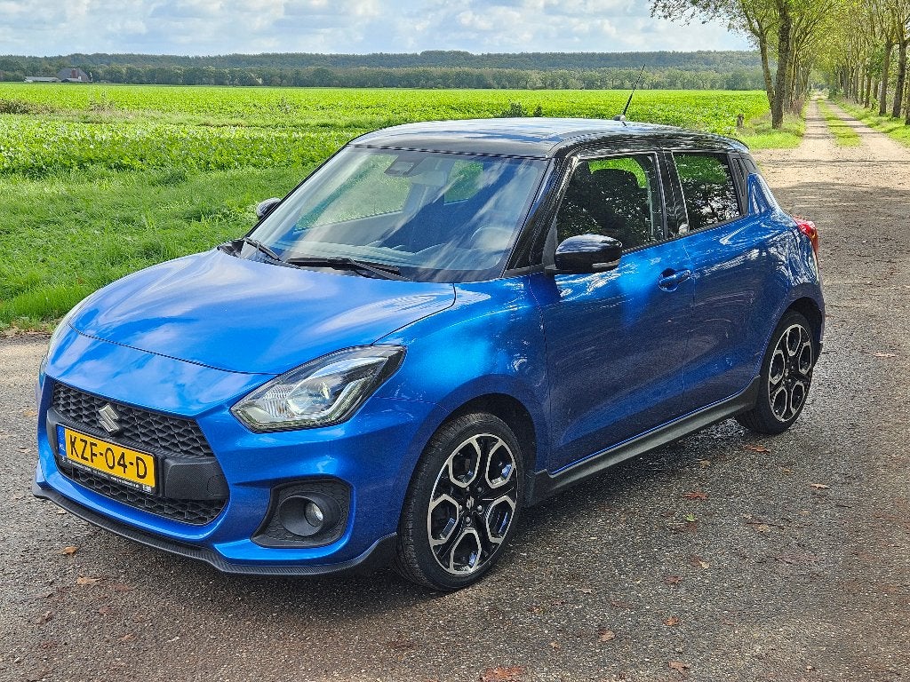 Suzuki Swift 1.4 Sport Hybrid 2021 82.205 km bleu métallisé, Autos, Achat, Euro 6, Swift, 5 portes