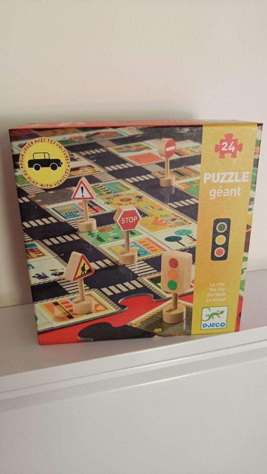 Puzzel De Stad Djeco, Ophalen