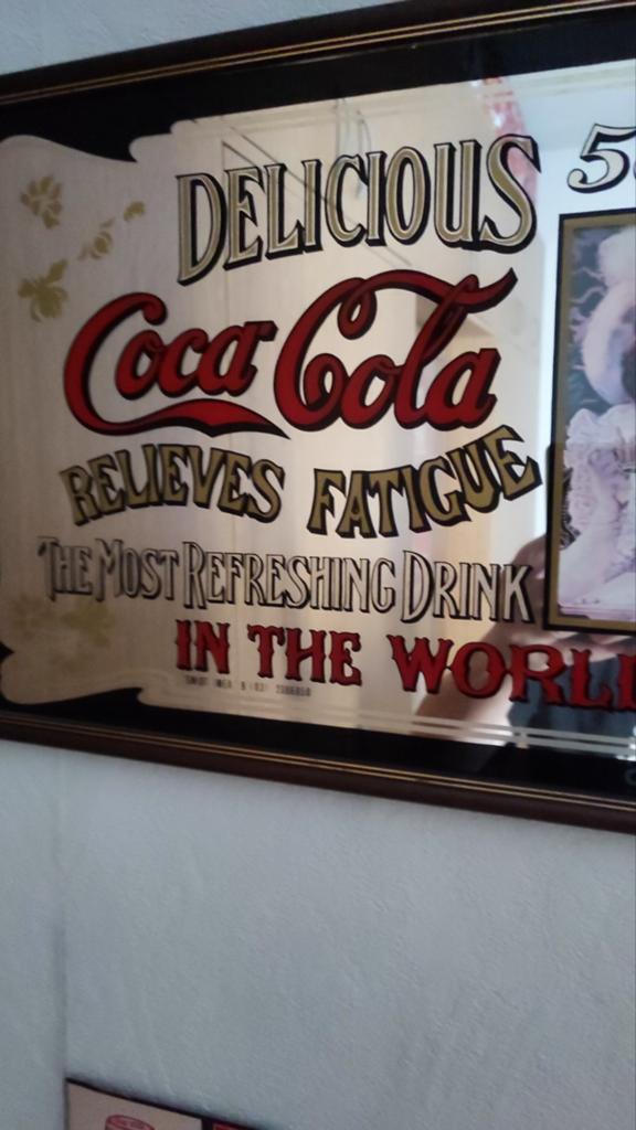 Kleine spiegel Coca Cola., Ophalen