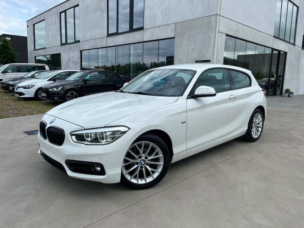 BMW 118 BMW 118i Sportline F21/benzine/Navi/2xPDC/Garantie, Auto's, 100 kW, Wit, 3 cilinders, Onderhoudsboekje