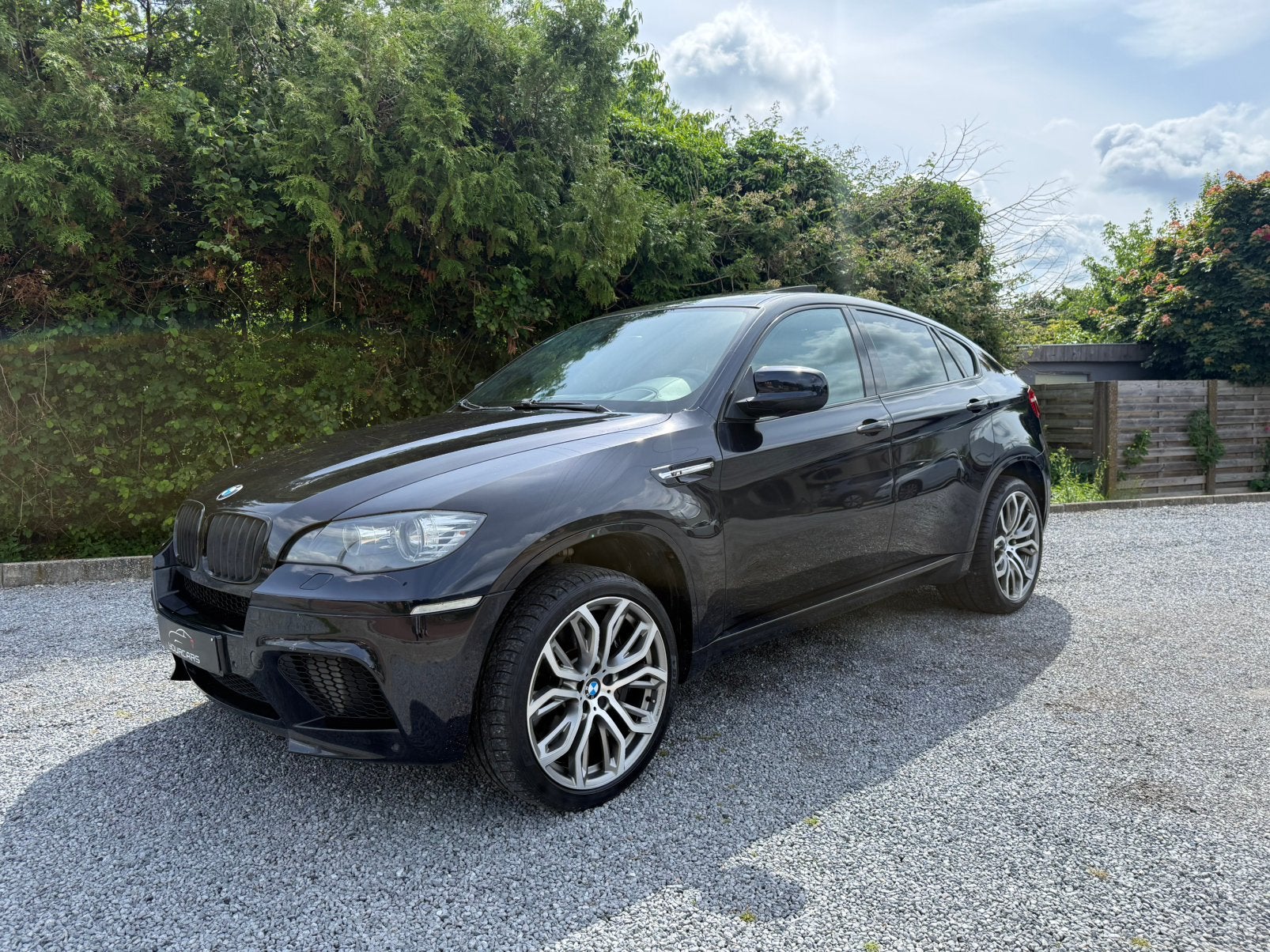 BMW X6 M 4.4iA V8 * ORIGINEEL BELGISCHE AUTO * FULL OPTIES, Auto's, Automaat, Zwart, 4395 cc, Zwart