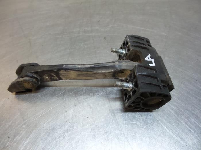 Butée 4portes arrière gauche d'un Opel Astra (Astra H 04-), -, Opel, 3 mois de garantie, Utilisé