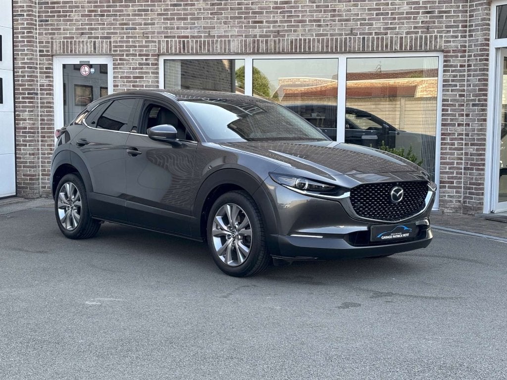Mazda CX-30 2.0 M-HYBRID / Leder / Bose / 65000km, Auto's, Mazda, 4 cilinders, Regensensor, Leder, Bedrijf