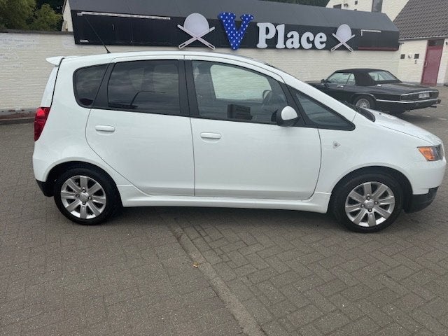 Mitsubishi Colt 1300 Benzine Airco ALU Verwarmde St! 84 DKM!, Auto's, Mitsubishi, Euro 5, Stof, 4 cilinders, Bedrijf