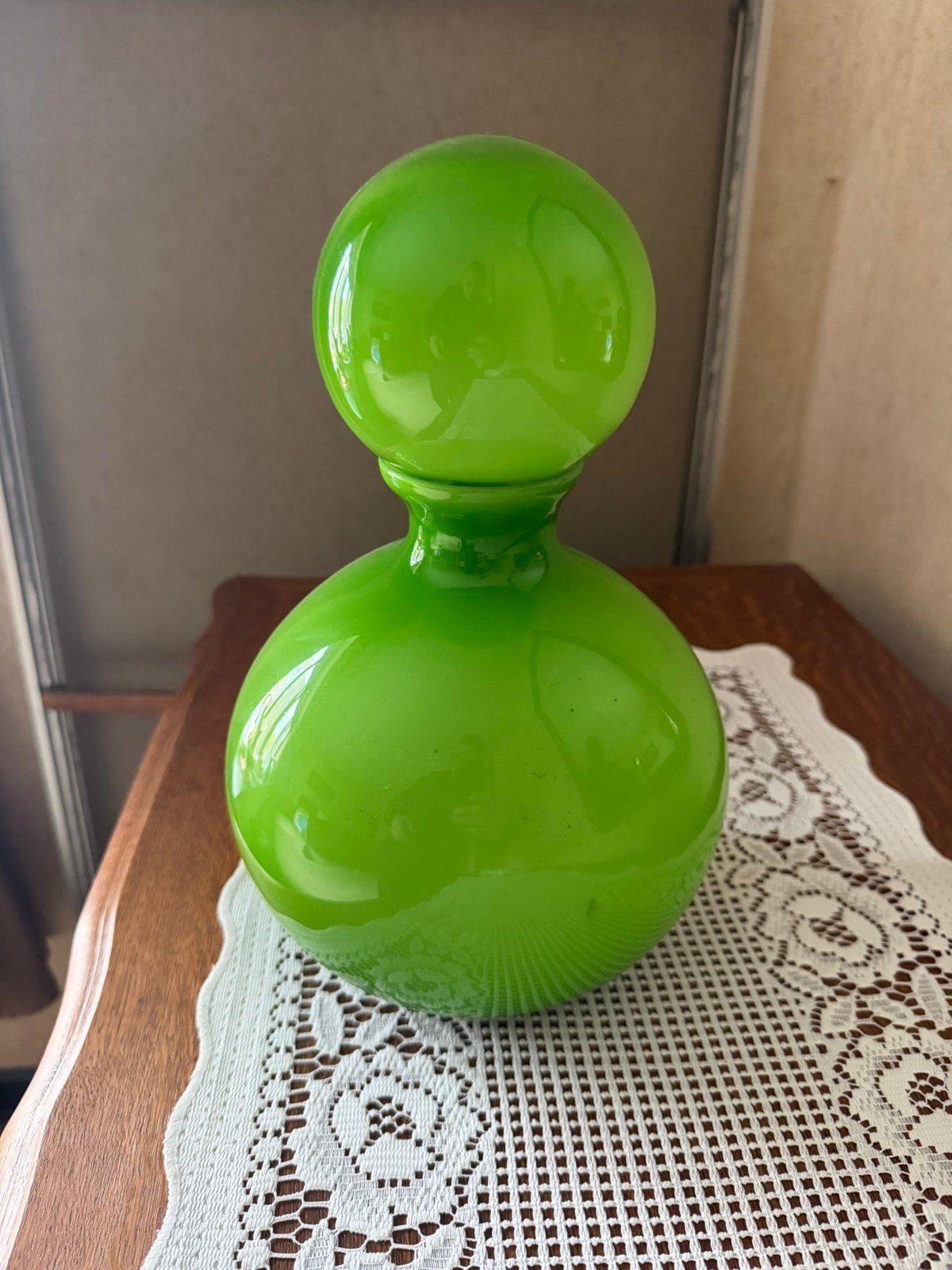 Helder groene glazen fles, Enlèvement