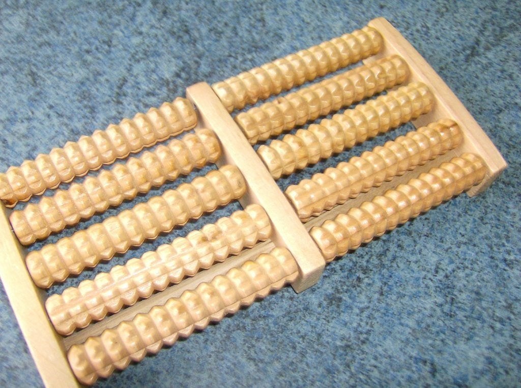 Houten voetmassage roller, Ophalen