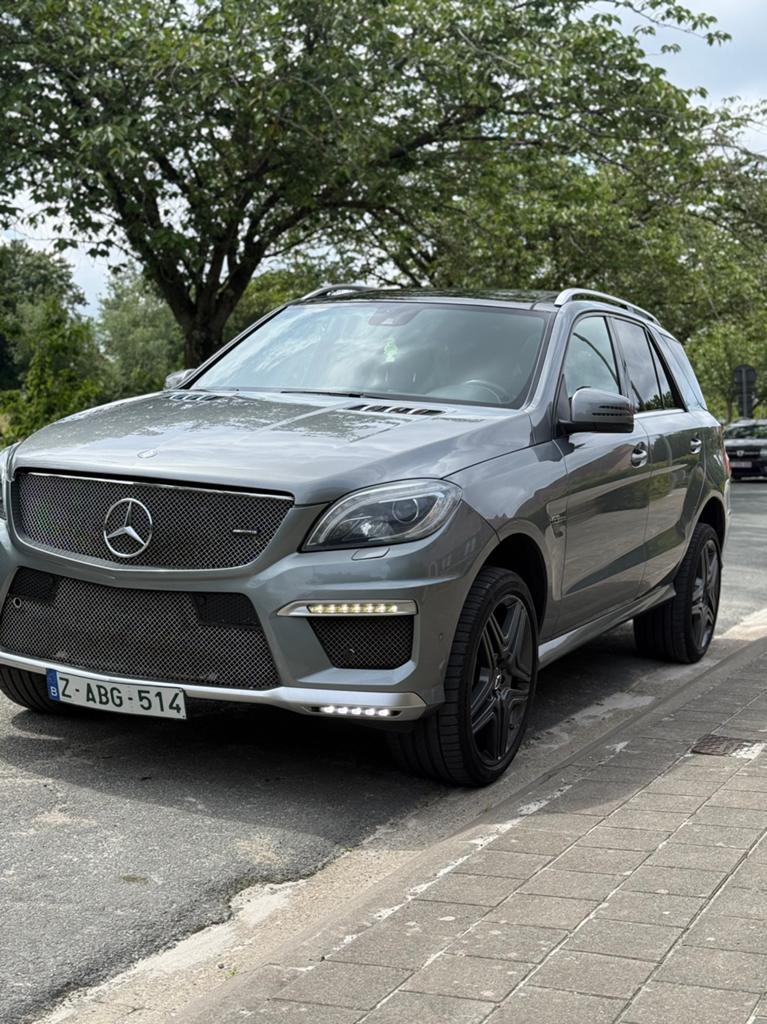 Mercedes Benz ML63 AMG, Auto's, Automaat, Euro 5, Zwart, Leder