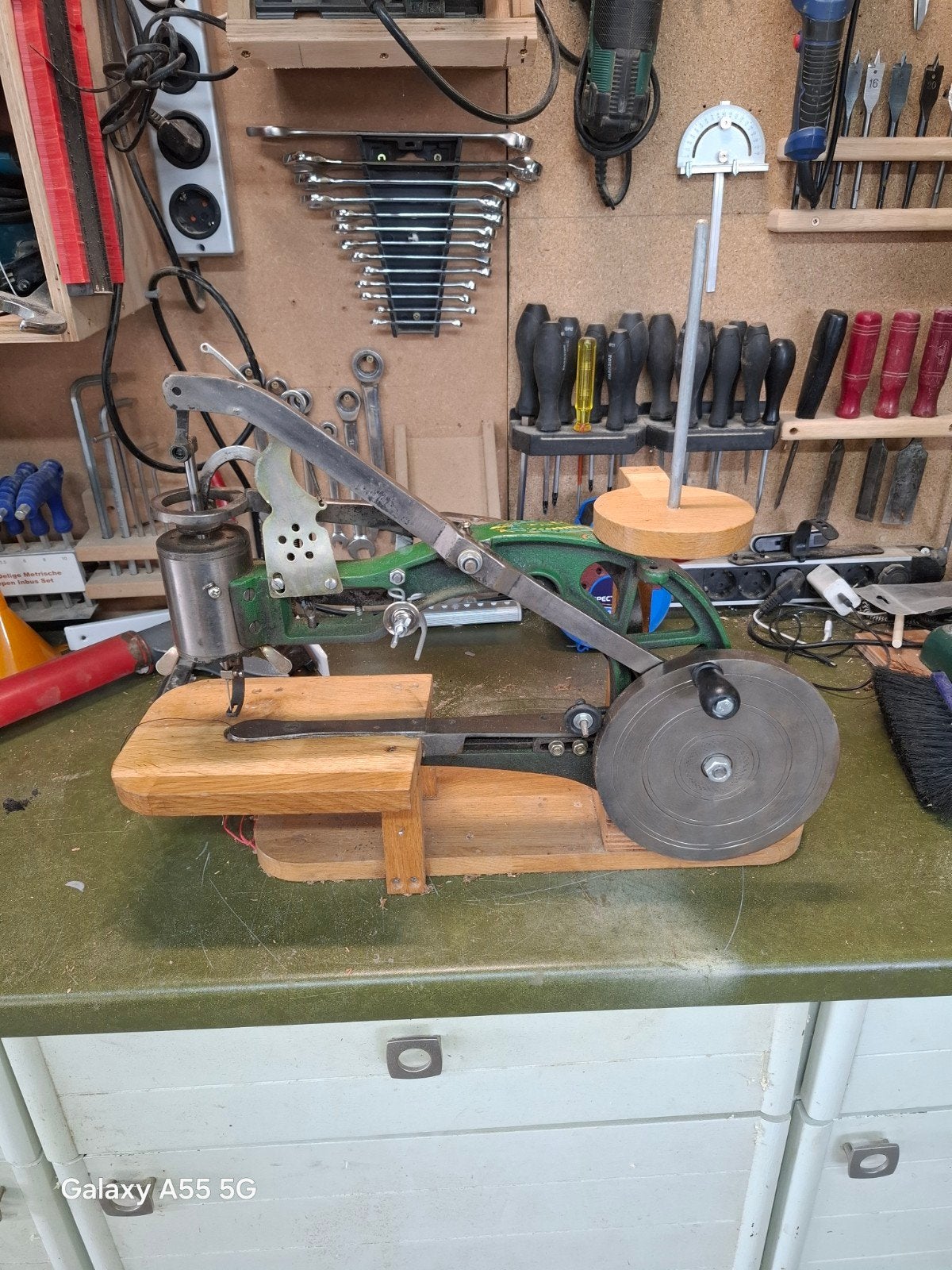 handnaaimachine voor lederbewerking, Ophalen