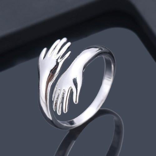 Liefdevolle Knuffel, verzilverde wikkelring, Handtassen en Accessoires, Ringen, Ophalen of Verzenden, Nieuw, Zilver, Overige materialen