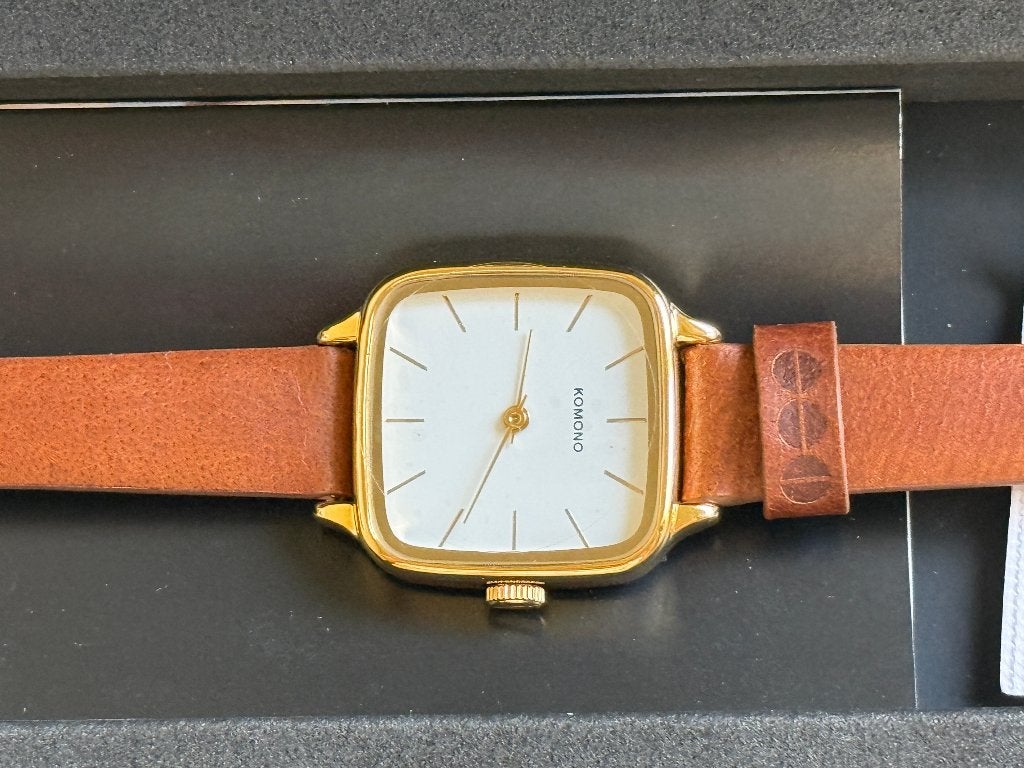Montre carrée dorée KOMONO avec bracelet en cuir véritable, Autres marques, Enlèvement ou Envoi, Autres matériaux, Autres matériaux