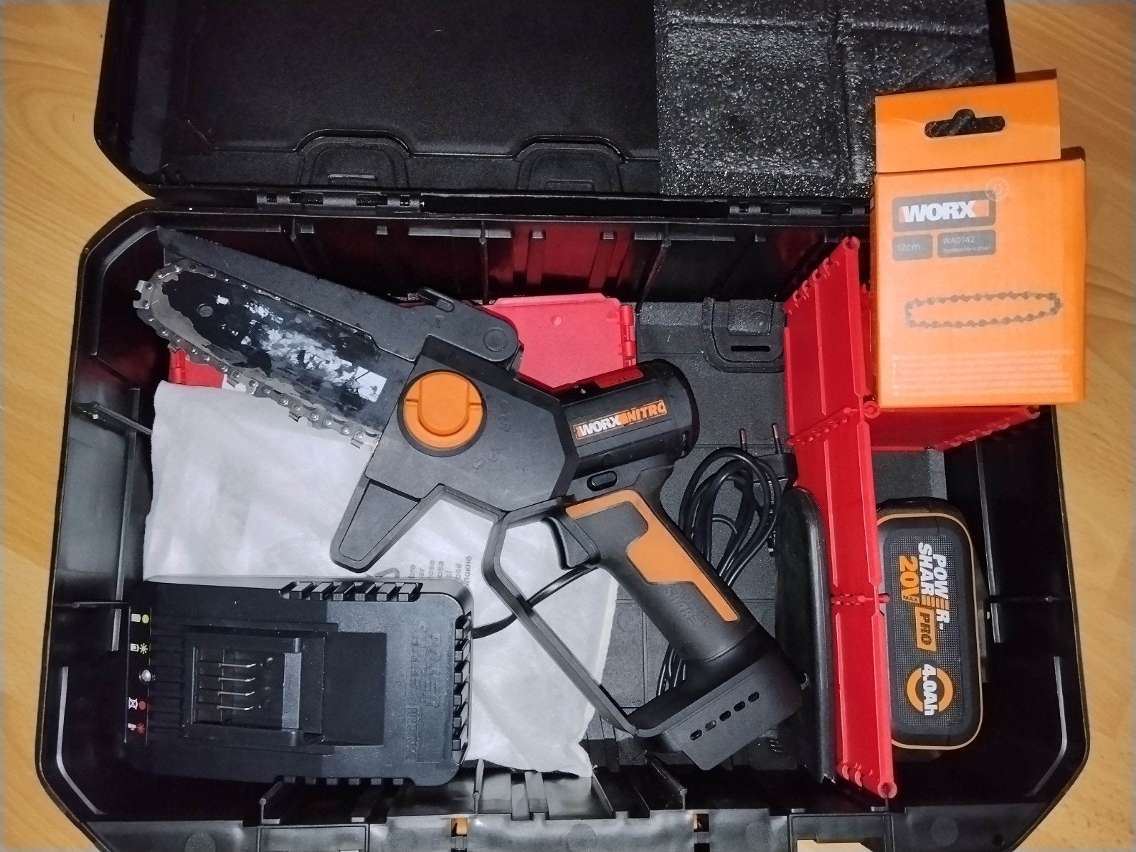 Worx Nitro WG325E mini-kettingzaag, Ophalen