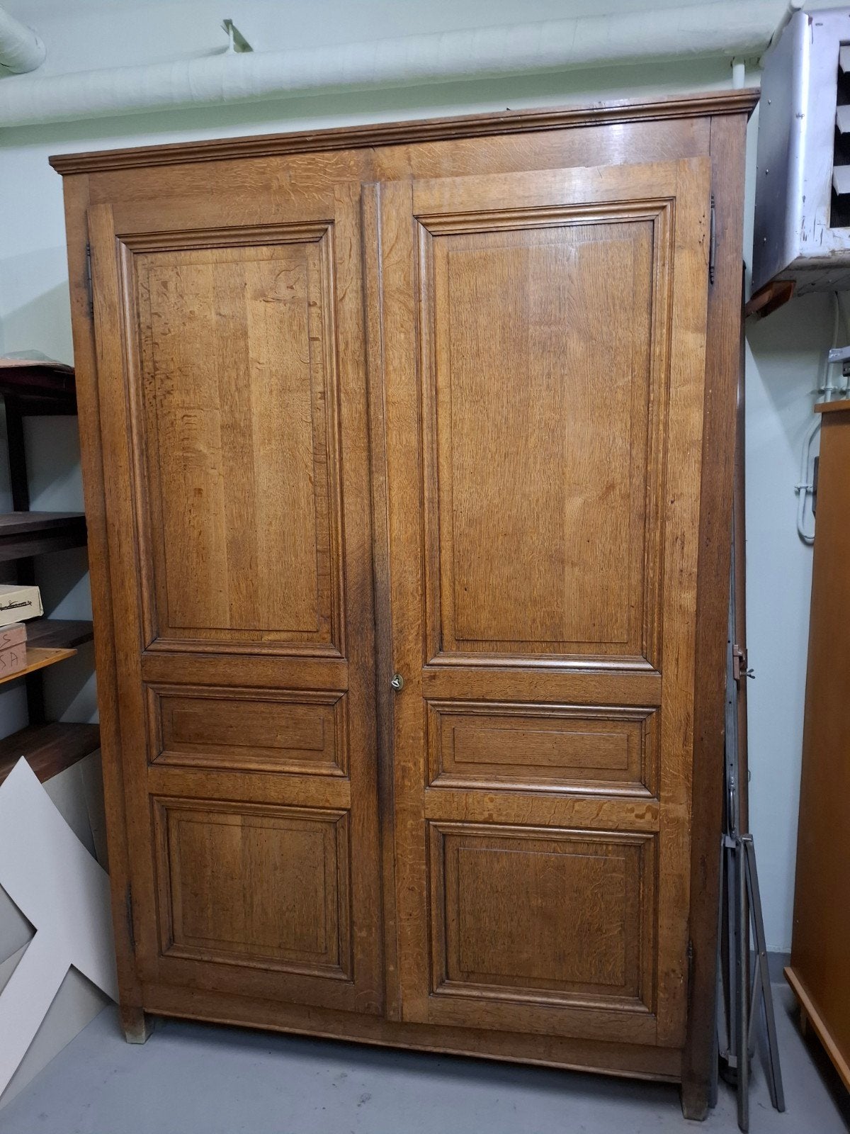 Grande armoire ancienne, Ophalen