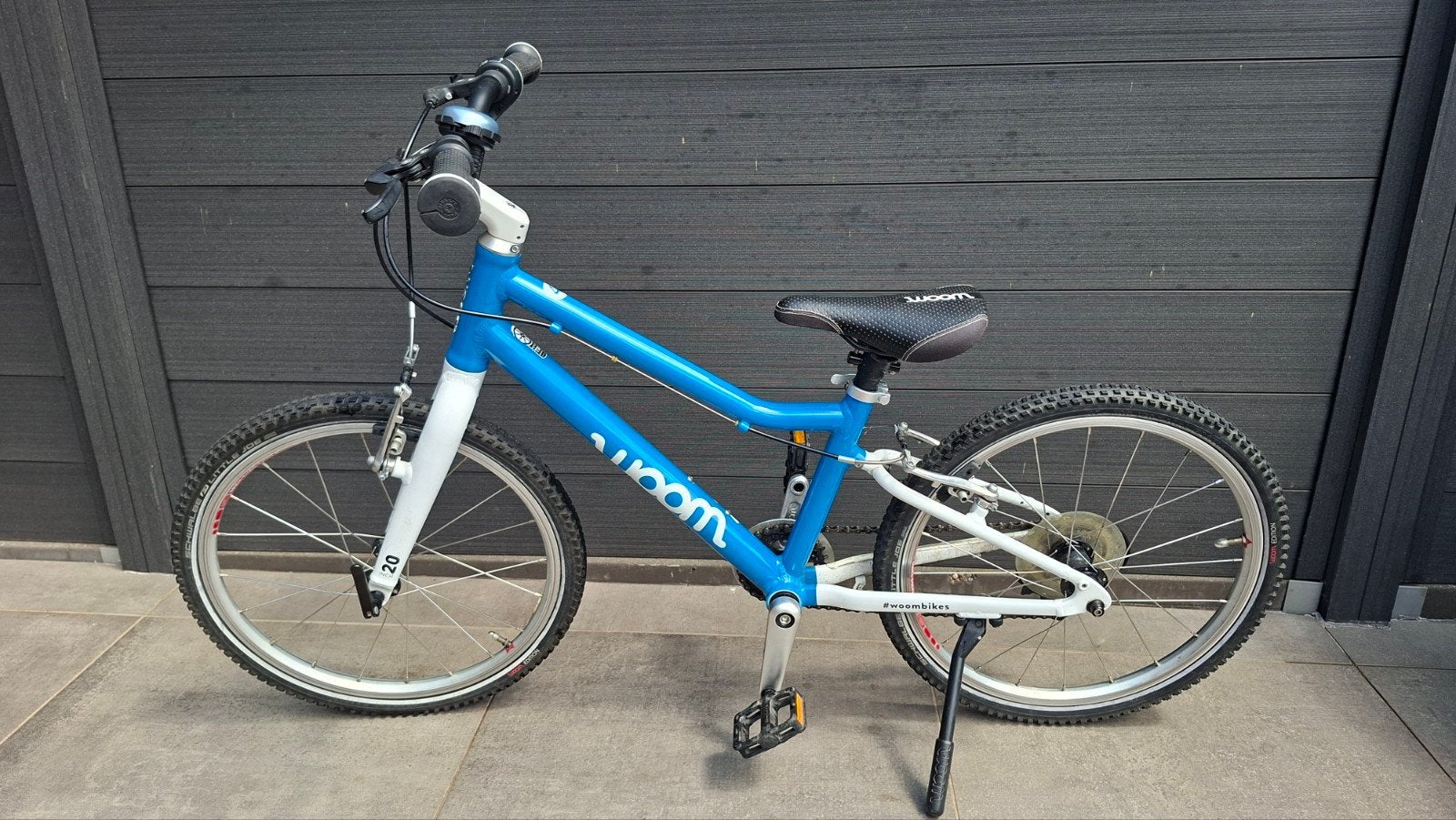 Blauwe fiets Woom 4 - 20inch in zeer goede staat!, Vélos & Vélomoteurs, Vélos | Vélos pour enfant, Enlèvement