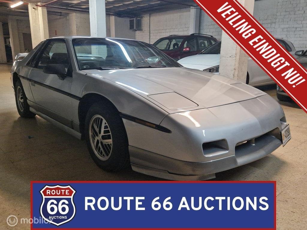 Pontiac Fiero | 1985 | Route 66 Auctions, Achat, Pontiac, Entreprise, Boîte manuelle