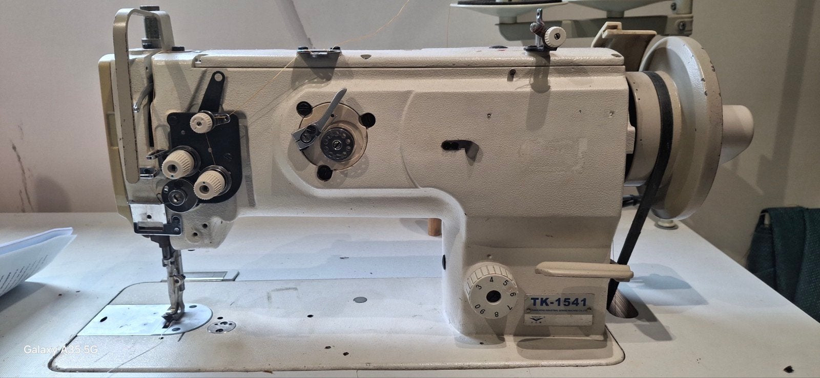 Industriele naaimachine, Ophalen, Naaimachine
