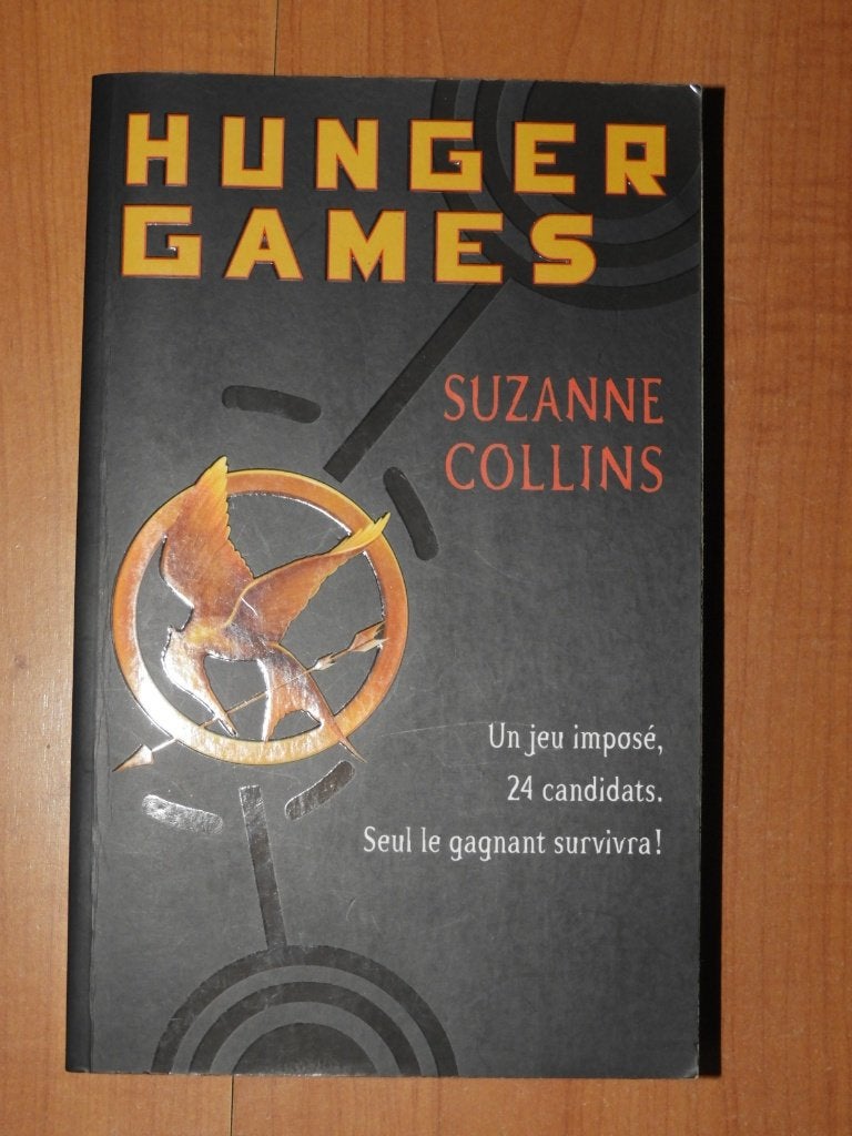 Roman "Hunger Games" - Suzanne Collins, Ophalen of Verzenden, Zo goed als nieuw