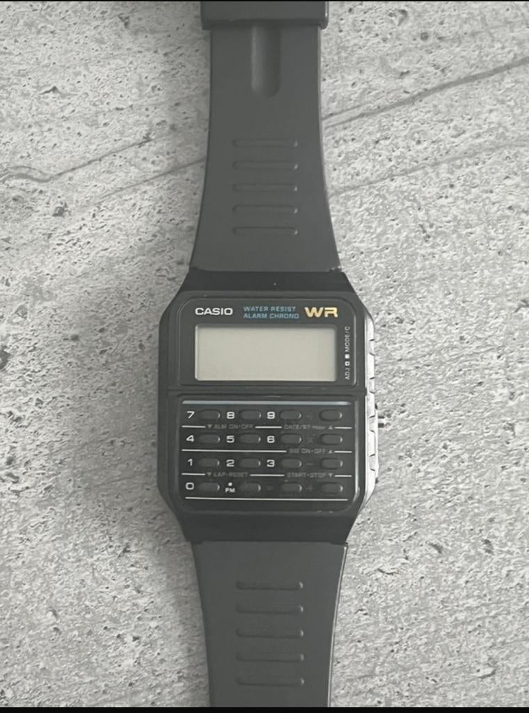 Montre calculatrice Casio CA-53W, Montre-bracelet, Casio, Enlèvement ou Envoi, Comme neuf
