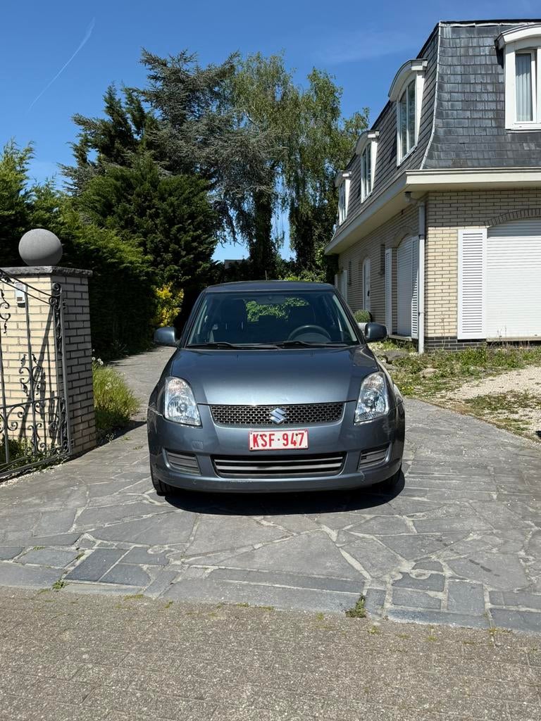 Suzuki Swift 2009 Benzine Airco 38000 km  Mechanisch Perfect, Zwart, Swift, Leder, Handgeschakeld