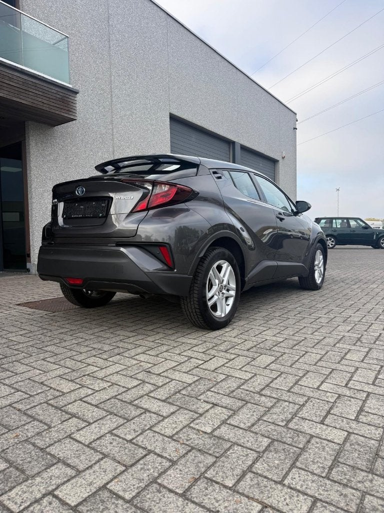 Toyota C-HR 1.8 Hybrid automaat - 58.579 km, Autos, Argent ou Gris, Achat, 725 kg, Euro 6