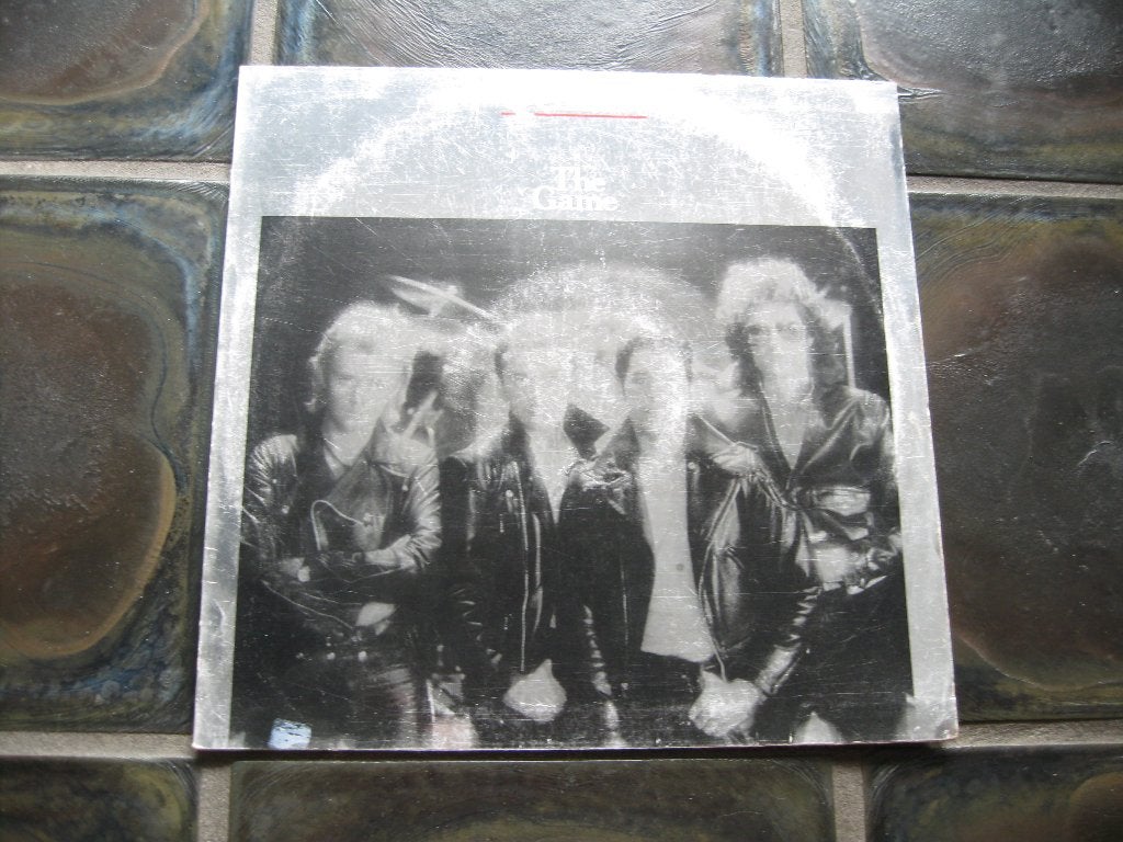 queen the game made in holland lp, CD & DVD, Pop rock, Enlèvement ou Envoi, Utilisé, Housse de protection extérieure