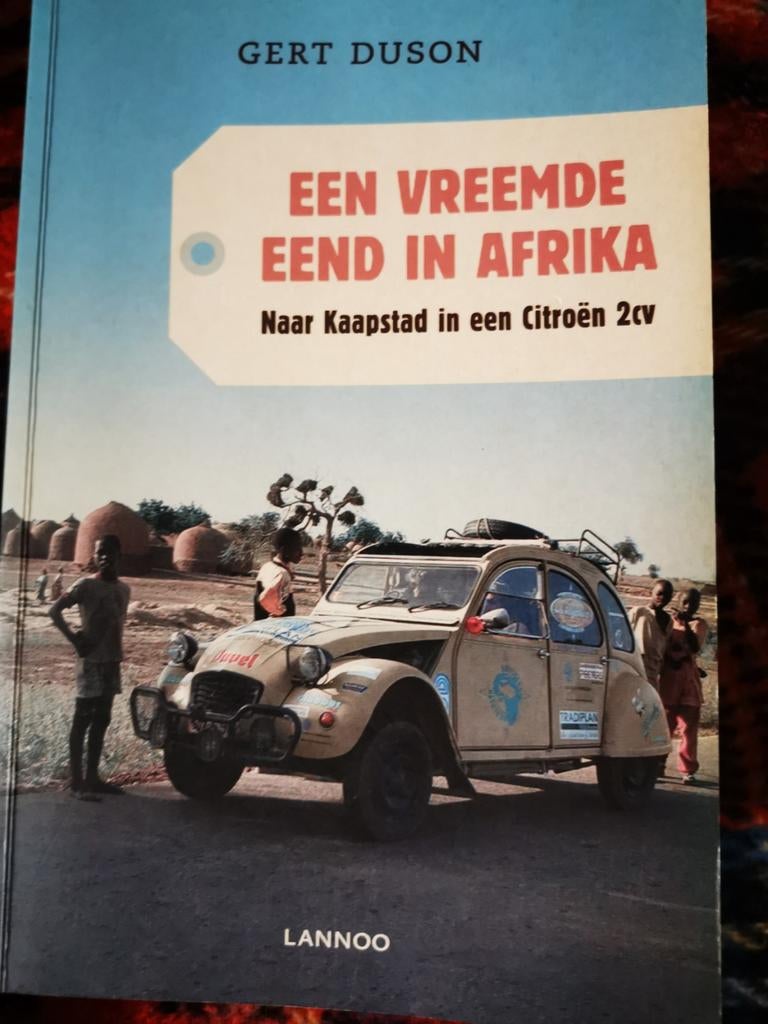 Één vreemde eend in Afrika naar Kaapstad in een Citroën 2CV, Boeken, Auto's | Boeken, Zo goed als nieuw, Citroën, Ophalen of Verzenden