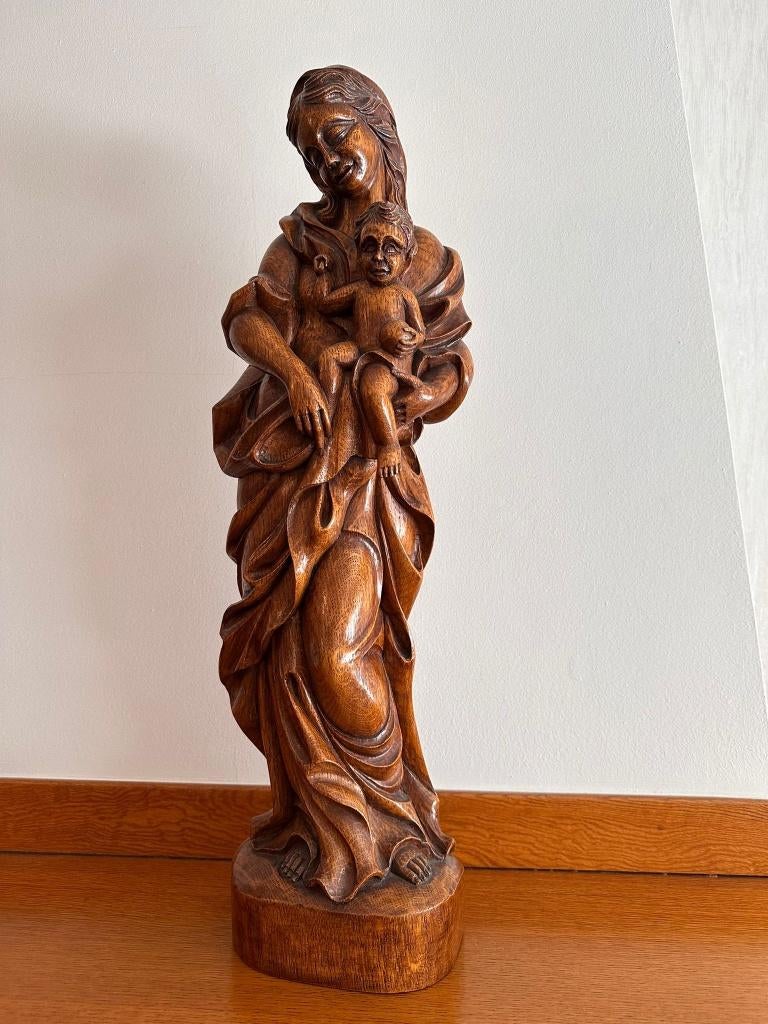 Groot massief houten Mariabeeld, Ophalen